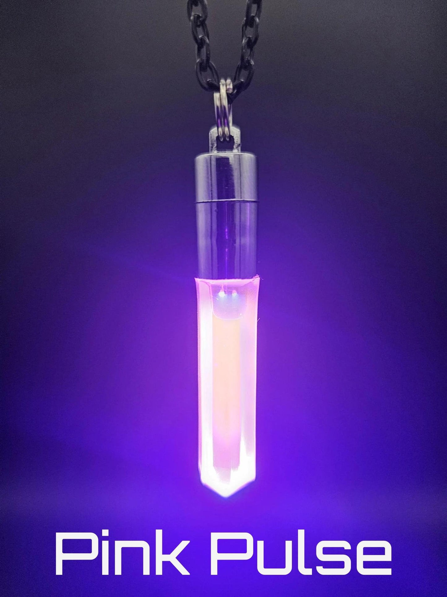 Glo Nova “Pink Pulse” LED crystal pendant necklace with soft pink glow—handmade light-up rave, cosplay, and festival jewelry accessory.